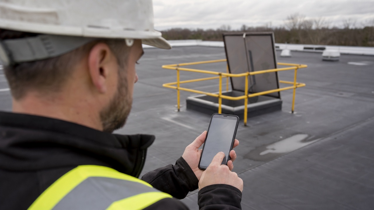 Contractor signing in to the RAPP portal from the roof