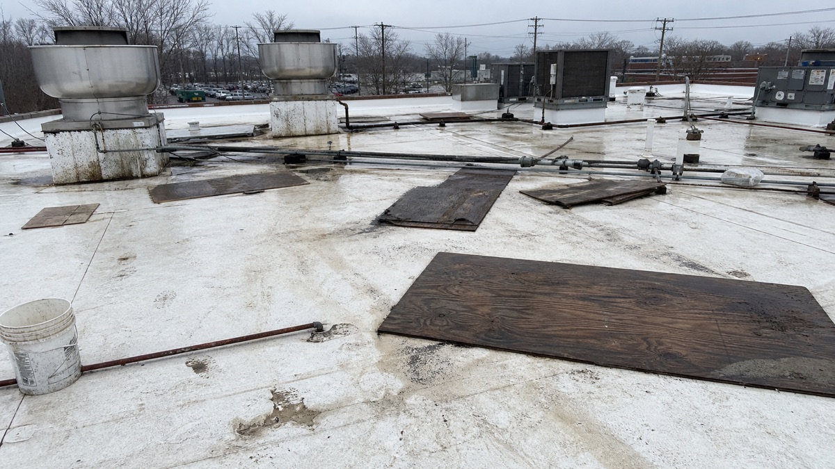 Uncontrolled roof traffic and debris left on a warranted roof